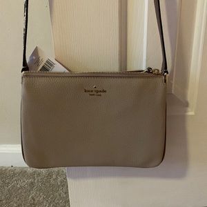 Never used Kate spade purse, adjustable strap